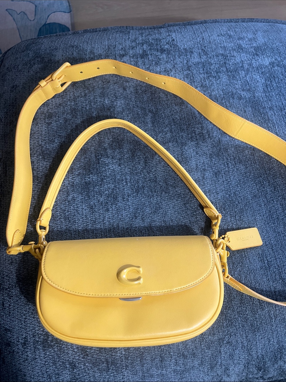 Coach Emmy Saddle Bag 23 in canary yellow glovetanned leather.  Used once